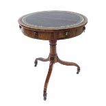 Small Georgian and later walnut drum table, the later faux gilt leather top over three drawers and