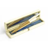George III ivory and gold inlaid toothpick case, the hinged lid opening to reveal a mirror and