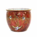 A.G Harley Wilton Ware red lustre ovoid jardiniere, with an opalescent interior, the exterior