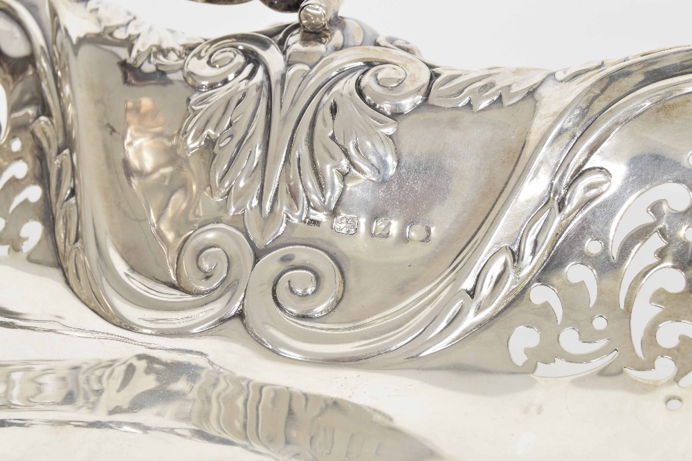 Late Victorian silver pierced oval cake basket, with foliate scroll decoration and a cast swing - Image 2 of 2