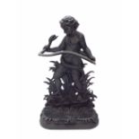 Coalbrookdale style cast metal stick stand, modelled with a cherub holding a snake, recent, 32.5"