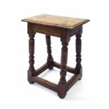 Antique oak joynt stool, the rectangular top on turned supports united by stretchers, 17.75" x 10.