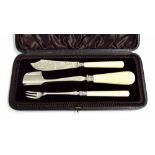 Victorian cased three piece cheese set, comprising stilton scoop, butter knife and cheese fork,