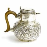Late Victorian lidded silver water jug, with floral repousse body and wooden handle, 5" high,