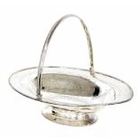 Victorian silver oval cake stand with a swing handle, with bright-cut engraved garlands, maker