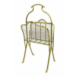 Early 20th century polished brass and mesh magazine rack, 32" high