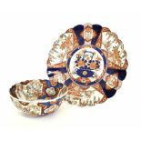 Large Japanese Imari oval charger, with a scallop rim decorated with foliate panels in typical
