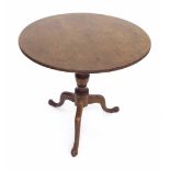 Georgian mahogany and later circular occasional table, the reeded top supported upon a gun barrel