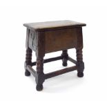 Interesting antique oak box seat stool, the rectangular iron hinged top revealing an open