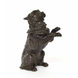 19th century cast bronze inkwell modelled as a begging terrier, the hinged head enclosing a glass