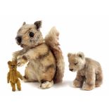 Steiff squirrel, with applied button to ear, 8" high; Steiff bear cub, button to ear, 4.5" high;