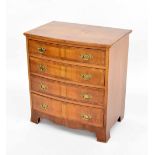 Small walnut bowfront chest of drawers in the Regency manner, the crossbanded quarter veneer top