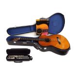 Yamaha G-255SII guitar in original case with guitar method tutor book; together with a Conrad
