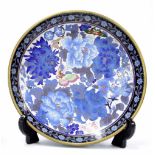 Decorative cloisonne plate, decorated centrally with butterflies and flowers on a blue ground with a