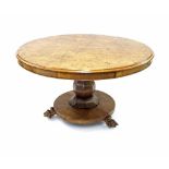 Victorian figured walnut circular dining table, supported upon an octagonal baluster column and