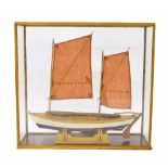 Large scale model of a two masted gaff rigged sailing vessel, with painted hull and terracotta