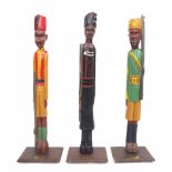 Three decorative carved standing figures of Indian and British Empire soldiers including the '
