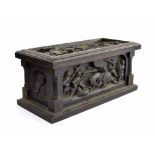 Interesting and decorative ebonised oak rectangular box, deeply carved in relief with medieval