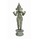 Antique bronze standing figure of Ganesha, sheathed with ring patinated bronze over a terracotta