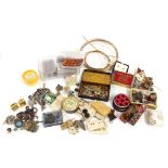 Box of assorted jeweller's spares including gold ring clasps, loose gem stones etc