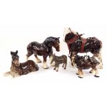 Five assorted pottery glazed models of horses and a donkey, the tallest 10" high (5)