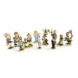 Collection of eight Goebel Hummel figures of children; together with three other similar style