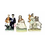 Three Victorian Staffordshire flatback pottery figures including Little Red Riding Hood and Daniel