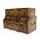 Georgian walnut serpentine table-top chest of drawers with brass side carry handles, 15" wide, 10"