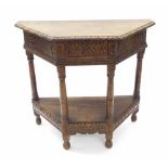 Antique oak credenza hall table, the angled top with foliate carved frieze over a single drawer
