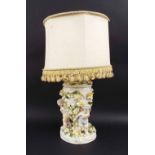 19th century German porcelain floral encrusted lamp base, of oval form with applied meandering