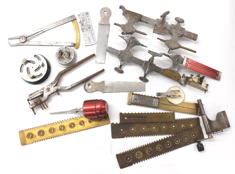 Selection of watchmakers tools including two turns, watch movement holders, pivot and wheel gouges
