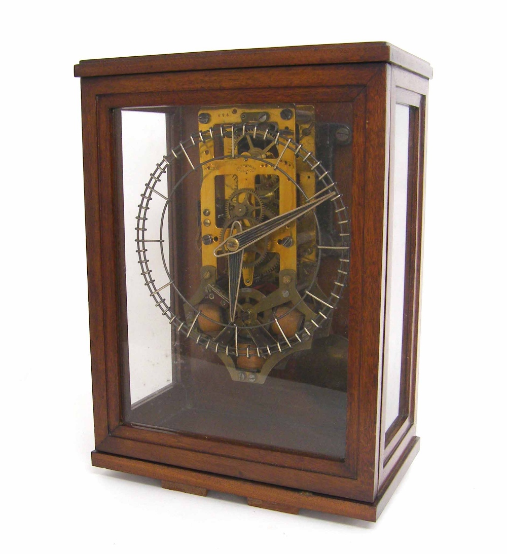 Unusual skeleton electric clock inscribed on the front movement plate Self Winding Clock Co.,