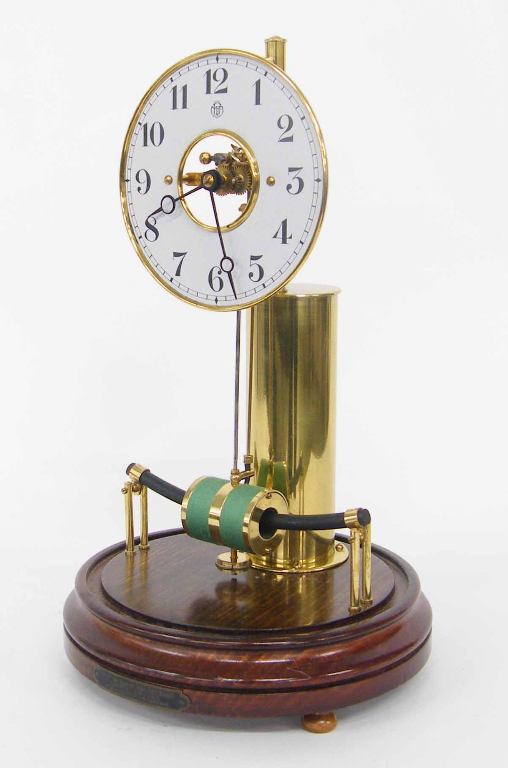 Electric mantel clock, the 5.25" white chapter ring bearing the maker's logo MFB and inscribed