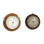 Circular barometer, the 8" white dial signed Banks, Woolwich and fitted with thermometer, within a
