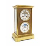 Good French ormolu two train mantel clock with calendar, the 4" clock chapter ring enclosing a