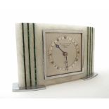 Art Deco style Elliott mantel clock timepiece, the 4" square silvered dial plate inscribed Garrard &
