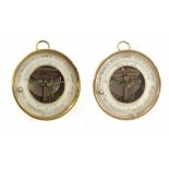 Two similar Holesteric circular brass cased barometers, each 4.75" diameter (2)