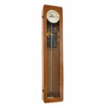 Synchronome electric master clock, the 8.25" silvered dial with centre seconds, within an oak glazed