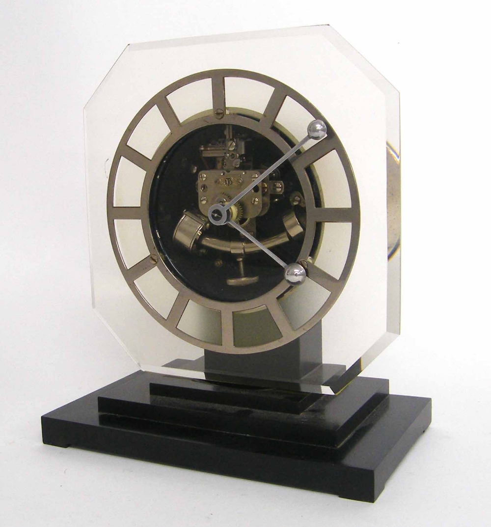 Ato electric mantel clock, the 5.25" silvered Perspex chapter ring within an octagonal surround