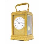 Drocourt repeating carriage clock striking on a gong, the 2.25" white dial within a gilded mask