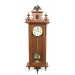 Walnut double weight Vienna regulator wall clock, the 6.25" cream dial within a pillared glazed