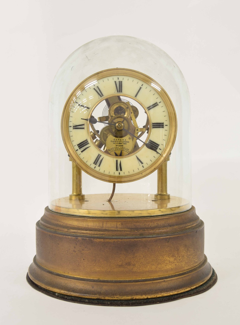 Good Eureka electric mantel clock, the 4.25" cream chapter ring enclosing a skeletonised centre