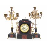 French black and red marble two train mantel clock garniture, the 3.5" cream dial within a stepped