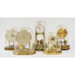 Tiffany Never Wind electric mantel clock, under a glass dome, 10.25" high; also four other various