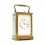 Repeater carriage clock striking on a gong, within a corniche brass case, 7.25" high (new platform)