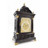 English ebonised triple fusee boardroom mantel clock, the 7.25" silvered chapter ring enclosing a