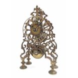 Brass single fusee skeleton clock, 11" high (pendulum)