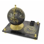 Contemporary desk compendium, with porcelain world globe and calendar dial, upon a rectangular black