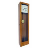 Electric master clock, the 9" square cream dial within a light oak glazed case, 51" high (pendulum)