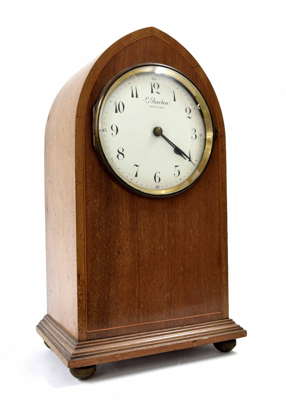 L. Bardon electric mantel clock, the 5.25" white dial within a mahogany lancet case inlaid with